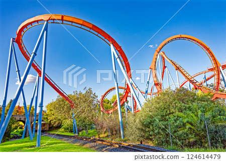Roller Coaster in funny amusement park. Roller Coaster in funny amusement park. 124614479