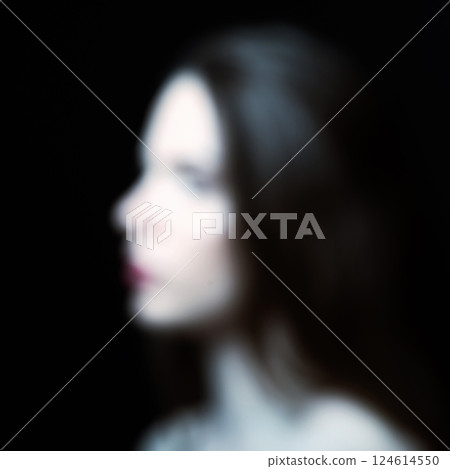 Blurred and out of focus abstract woman portrait Blurred and out of focus abstract woman portrait 124614550