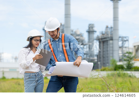 Professional Petroleum Refinery engineer team working building oil and gas power industrial plant. Professional Petroleum Refinery engineer team working building oil and gas power industrial plant. 124614605
