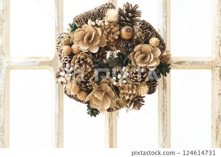 Christmas wreath decorated on a window sill Christmas image Christmas wreath decorated on a window sill Christmas image 124614731