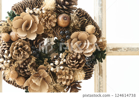Christmas wreath decorated on a window sill Christmas image 124614738