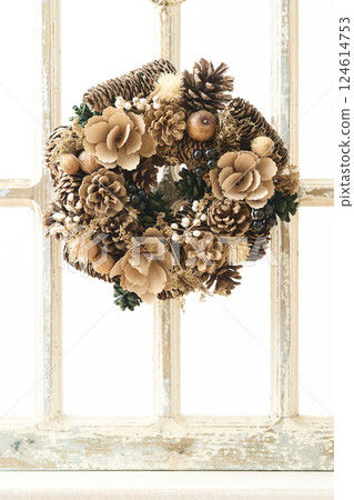 Christmas wreath decorated on a window sill Christmas image 124614753