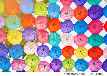 multicolored bright colorful umbrellas decoration on festive street in Tashkent 124614800