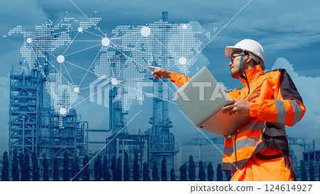 Professional Engineer petroleum industry worker with refinery overlay world wide map connection 124614927