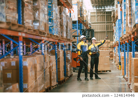 Warehouse workers working together, Inventory employee team staff in duty storage warehouse building Warehouse workers working together, Inventory employee team staff in duty storage warehouse building 124614946
