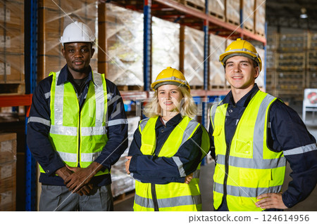 group professional warehouse worker. stock inventory team staff employee working in cargo storage 124614956