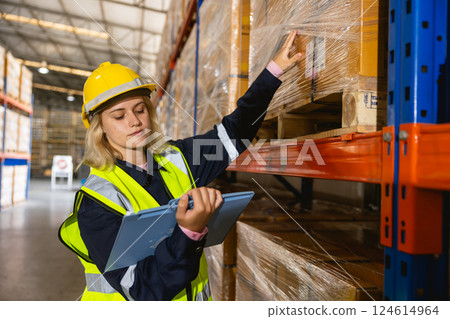 caucasian women worker. professional warehouse worker. stock inventory staff working in logistic caucasian women worker. professional warehouse worker. stock inventory staff working in logistic 124614964
