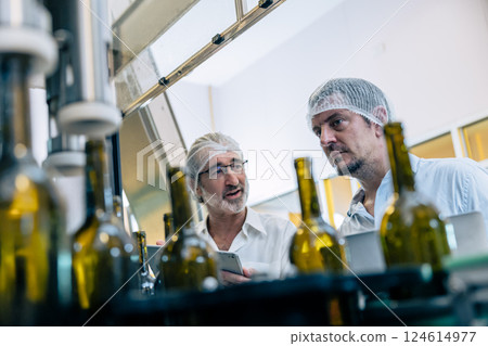professional engineer technician man service check machine in drink factory for quality standard professional engineer technician man service check machine in drink factory for quality standard 124614977