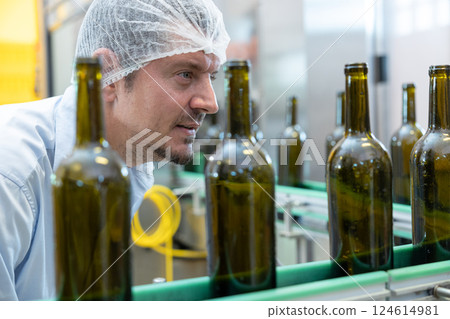 professional engineer technician man service check machine in drink factory for quality standard professional engineer technician man service check machine in drink factory for quality standard 124614981
