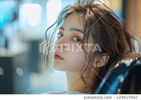 "AI-generated image" of a woman photographed at a beauty salon 124615082