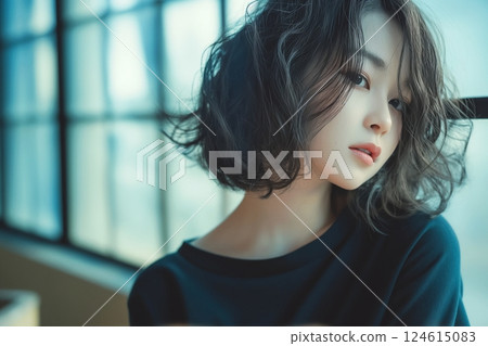 "AI-generated image" of a woman photographed at a beauty salon 124615083