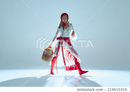 Confident young woman striding forward, white lace dress flowing, gaze intense, symbolizing personal evolution and duality of softness and strength. Confident young woman striding forward, white lace dress flowing, gaze intense, symbolizing personal evolution and duality of softness and strength. 124615910