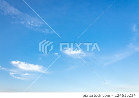 nature backdrop with blue sky and white fluffy clouds in morning light. bright and sunny weather forecast background 124616234
