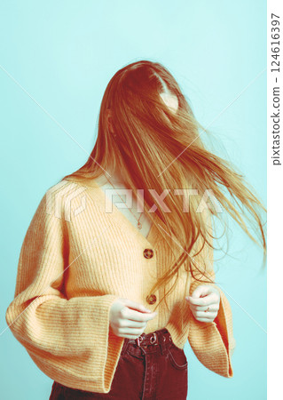 Wind blowing woman brown hair Wind blowing woman brown hair 124616397