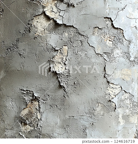 Layers of peeling gray paint create a textured surface with a vintage, weathered aesthetic. 124616719