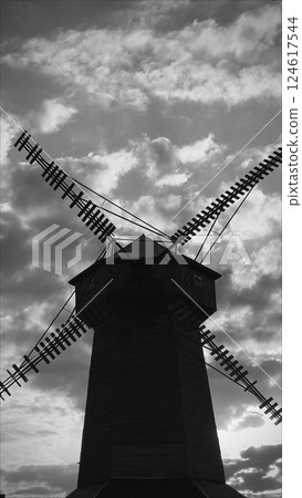 Close-up. Windmill at countryside. Windmill silhouette sky. black and white 124617544