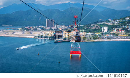 cable car ropeway cabins on cableway over sea to VinWonders Vinpearl Amusement Park in Nha Trang in Vietnam cable car ropeway cabins on cableway over sea to VinWonders Vinpearl Amusement Park in Nha Trang in Vietnam 124619137