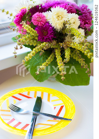 beautiful bouquet of bright chrysanthemums on a plate beautiful bouquet of bright chrysanthemums on a plate 124619362