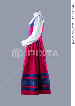 Elegant Red and Blue Medieval Dress with White Blouse. Beautiful historical garment featuring a vibrant red dress with blue accents and a delicate white blouse. Elegant Red and Blue Medieval Dress with White Blouse. Beautiful historical garment featuring a vibrant red dress with blue accents and a delicate white blouse. 124619586