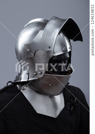 Polished Steel Knight Helmet Protection. Medieval head armor with visor and gorget detail. 124619652
