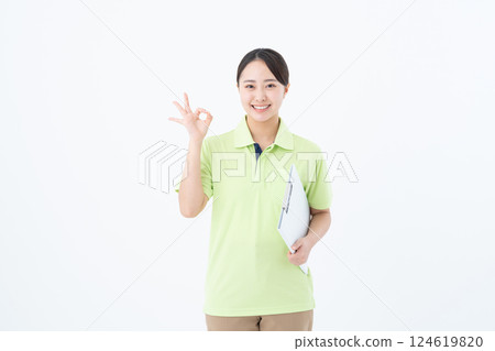 Young care worker woman 124619820