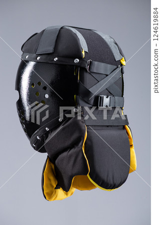 Modern Black Training Helmet for Medieval Combat. Protective headgear designed for historical martial arts and full-contact fighting. Modern Black Training Helmet for Medieval Combat. Protective headgear designed for historical martial arts and full-contact fighting. 124619884