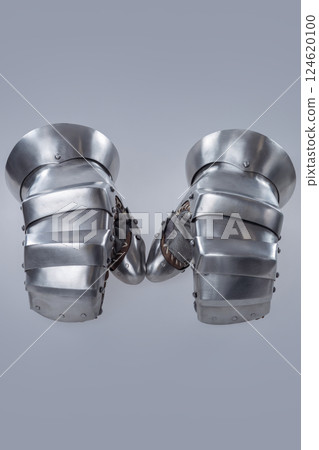 Pair of Silver Steel Gauntlets with Leather Interior. This image shows a pair of shiny silver steel gauntlets with a more basic and robust design compared to previous examples. The interior appears to Pair of Silver Steel Gauntlets with Leather Interior. This image shows a pair of shiny silver steel gauntlets with a more basic and robust design compared to previous examples. The interior appears to 124620100