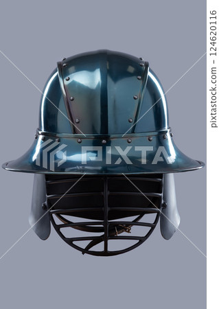 Dark Metal Helmet with Wide Brim and Grill Visor. This image shows a dark, possibly gunmetal grey, helmet with a wide, slightly sloping brim and a black grill-like visor covering the face. 124620116
