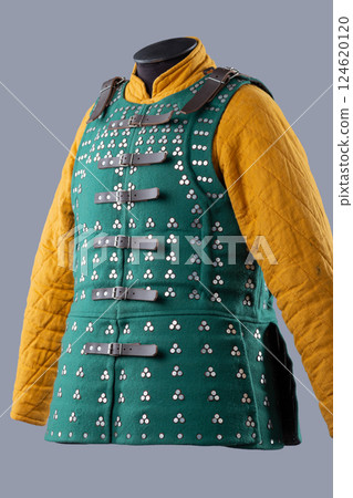 Dark Green Brigandine Armor with Studded Pattern. This image shows a dark green brigandine armor, featuring a pattern of small silver studs arranged in groups of three, and secured with black leather 124620120