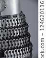 Detailed View of Silver Samurai Armor Plates and Lacing. This image provides a close-up view of silver samurai armor, showcasing the intricate overlapping plates and the dark lacing that holds them Detailed View of Silver Samurai Armor Plates and Lacing. This image provides a close-up view of silver samurai armor, showcasing the intricate overlapping plates and the dark lacing that holds them 124620136