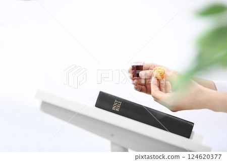 Holy Week Church Communion, Christians praying with bread and wine cups symbolizing the holy blood and body of Jesus, Lenten Easter background 124620377