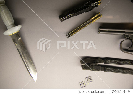 Diving knife and underwater pistol Diving knife and underwater pistol 124621469