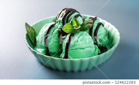 Chocolate mint ice cream. Mint flavoured ice cream with chocolate sauce. 124622263