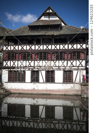 Half-timbered historic building reflected in Strasbourg, Alsace, France Half-timbered historic building reflected in Strasbourg, Alsace, France 124623285