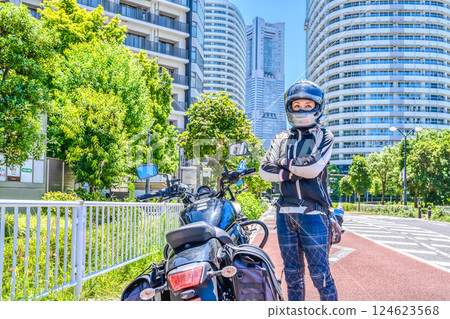 Smiling female rider touring Yokohama Smiling female rider touring Yokohama 124623568