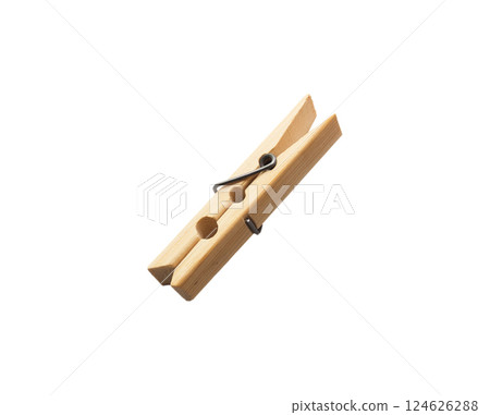 One decorative wooden clothespin isolated on white background. Office clothespins. One decorative wooden clothespin isolated on white background. Office clothespins. 124626288
