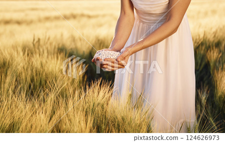 Many of the objects. Close up view of perlite in woman's hands that is on the agricultural field Many of the objects. Close up view of perlite in woman's hands that is on the agricultural field 124626973