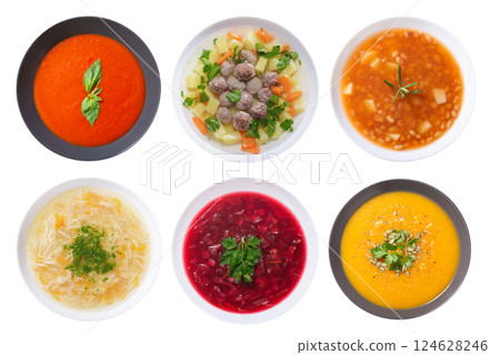 Set of plates of soup isolated on white background 124628246