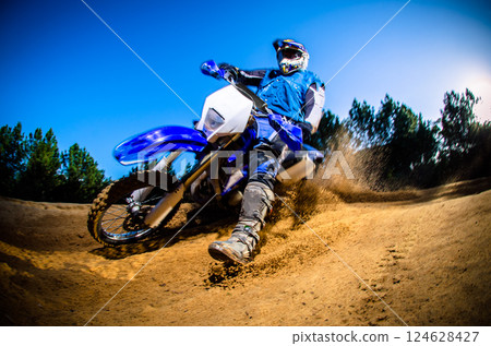 Enduro bike rider 124628427