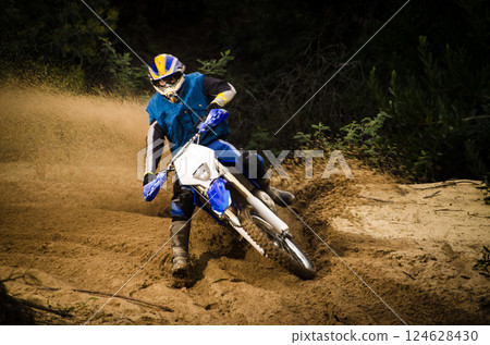 Enduro bike rider 124628430