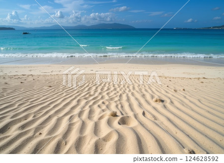 Pristine beach sand and sandy shores. 124628592