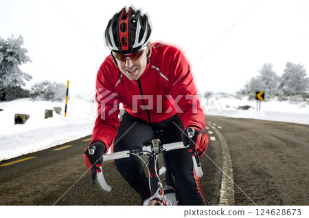 Cyclist on the road 124628673