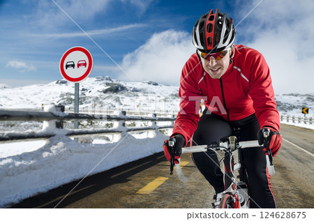 Cyclist on the road 124628675