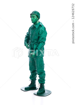 Man on a green toy soldier costume 124628732