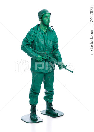 Man on a green toy soldier costume 124628733