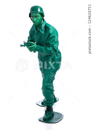 Man on a green toy soldier costume 124628751