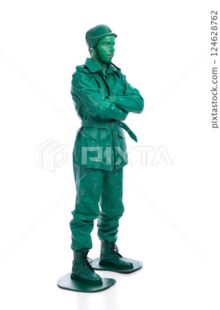 Man on a green toy soldier costume 124628762