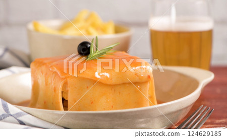Francesinha on plate 124629185