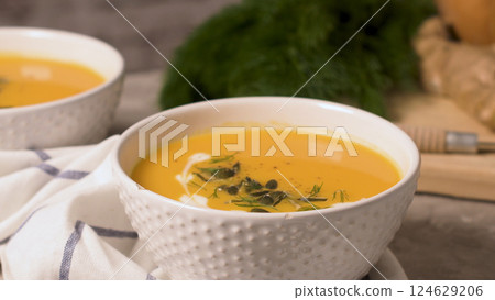 Homemade pumpkin soup Homemade pumpkin soup 124629206