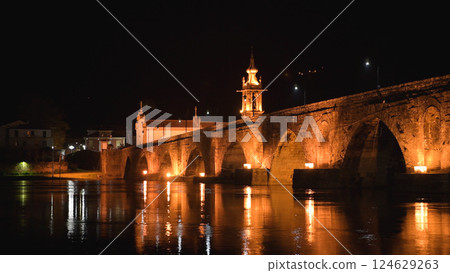 Bridge crossing the Rio Lima at night 124629263